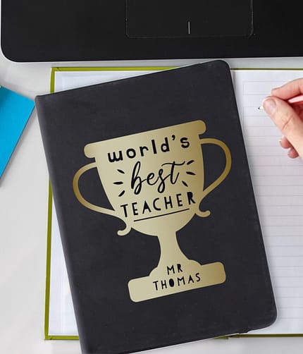 Personalised Worlds Best Teacher Trophy Black Hardback Notebook - ItJustGotPersonal.co.uk